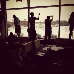 Teens working on the windows